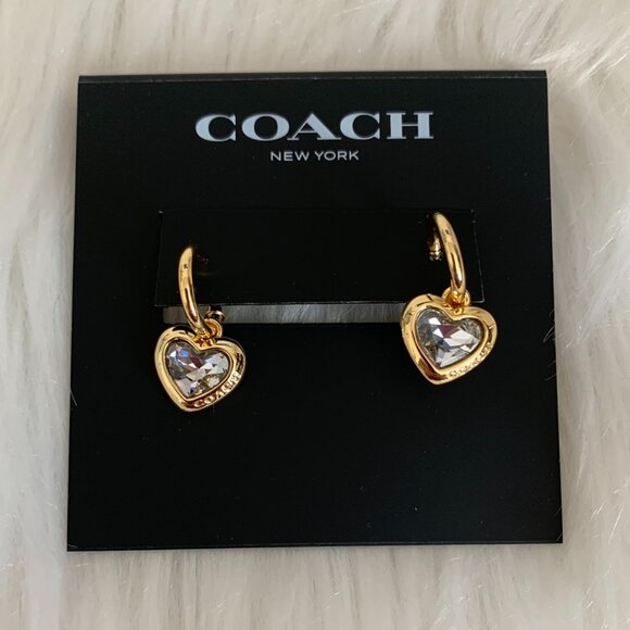 COACH Crystal Heart Charm Drop Huggies Earrings in Clear/Gold - Picture 1 of 2